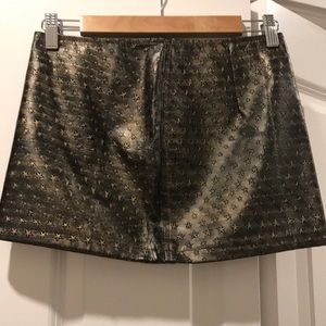 Bronze faux leather mini skirt with embossed stars
